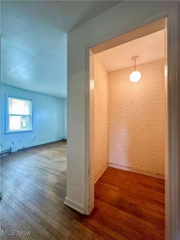 1357 Kearney St, Niles, OH 44446 - spare room featuring dark wood-style floors, baseboards, and wallpapered walls