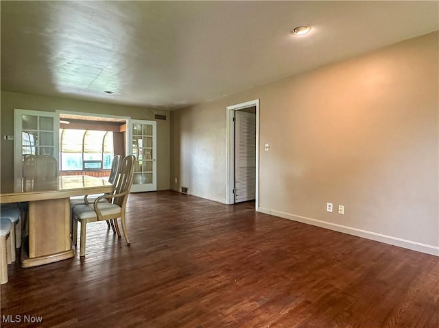 1357 Kearney St, Niles, OH 44446 - dining room featuring dark wood-type flooring and baseboards