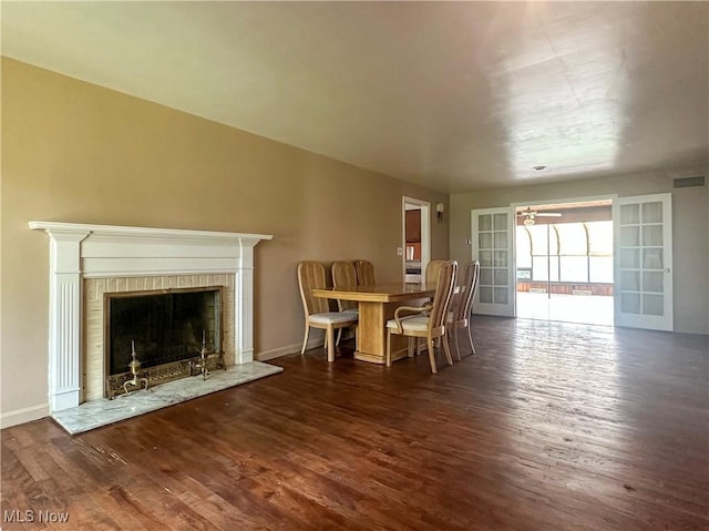 1357 Kearney St, Niles, OH 44446 - dining space with wood finished floors, a fireplace, and ceiling fan