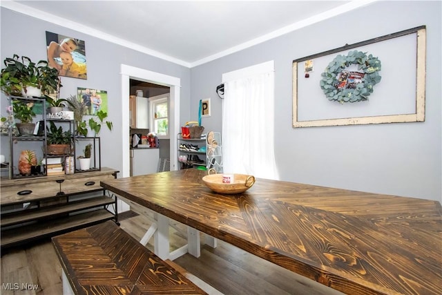 dining room with wood finished floors
