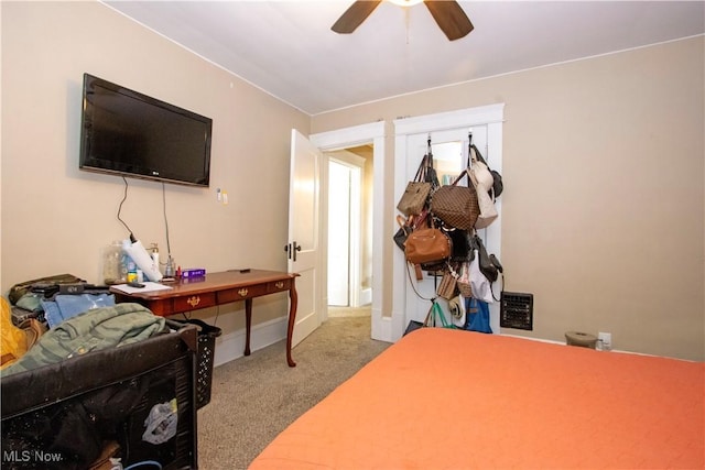 bedroom featuring carpet, ceiling fan, and baseboards