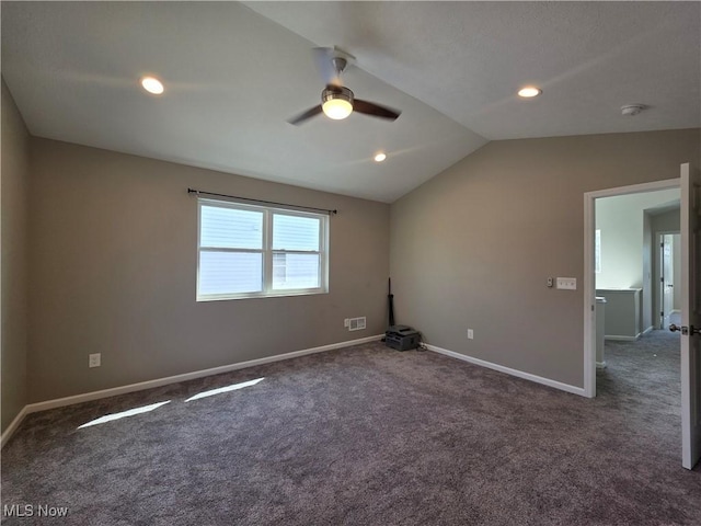 990 E Blvd, Aurora, OH 44202 - empty room featuring a ceiling fan, carpet floors, lofted ceiling, baseboards, and recessed lighting