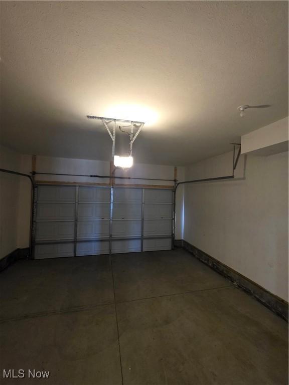 990 E Blvd, Aurora, OH 44202 - garage with baseboards