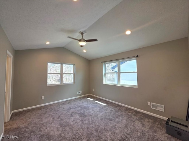 990 E Blvd, Aurora, OH 44202 - carpeted empty room featuring ceiling fan, baseboards, vaulted ceiling, a textured ceiling, and recessed lighting