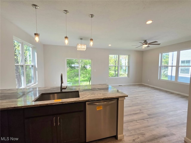 990 E Blvd, Aurora, OH 44202 - kitchen featuring dishwasher, a sink, healthy amount of natural light, baseboards, and recessed lighting