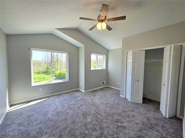 990 E Blvd, Aurora, OH 44202 - unfurnished bedroom featuring carpet flooring, vaulted ceiling, baseboards, ceiling fan, and a closet