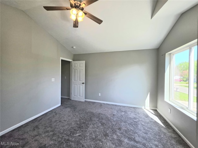 990 E Blvd, Aurora, OH 44202 - spare room featuring lofted ceiling, carpet, plenty of natural light, and a ceiling fan
