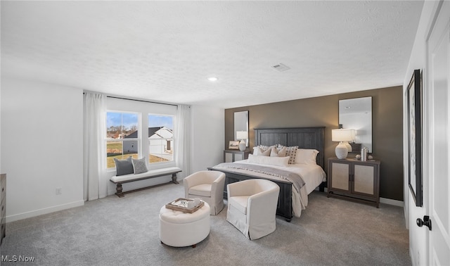 2986 Mcintosh Dr NE, Louisville, OH 44641 - bedroom featuring a textured ceiling, carpet floors, and baseboards
