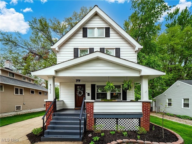 traditional style home with covered porch