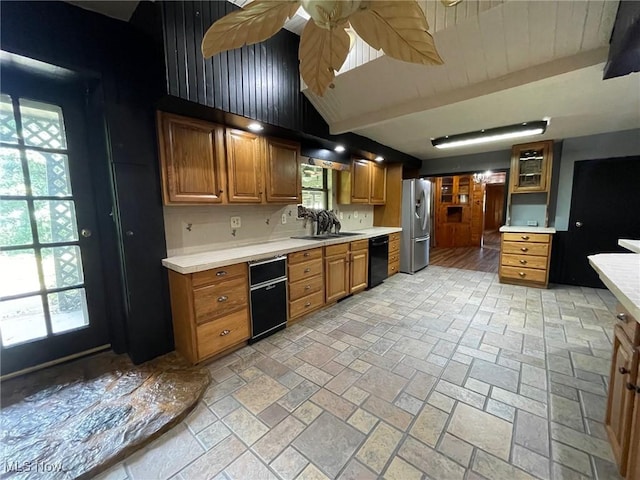 1585 County Road 9, Marietta, OH 45750 - kitchen featuring black dishwasher, freestanding refrigerator, light countertops, and a sink