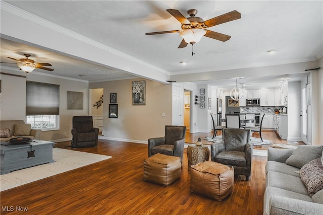 5500 12th Ave, Vienna, WV 26105 - living room with ceiling fan, wood finished floors, ornamental molding, and baseboards