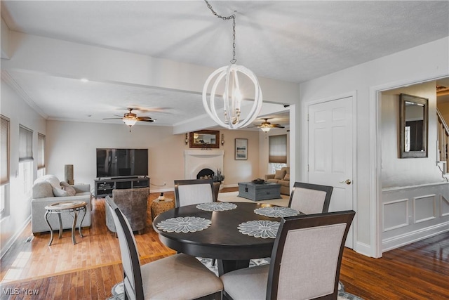 5500 12th Ave, Vienna, WV 26105 - dining room featuring a ceiling fan, wood finished floors, and a chandelier