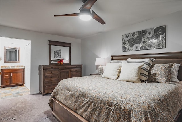 5500 12th Ave, Vienna, WV 26105 - bedroom featuring light carpet, a sink, connected bathroom, and ceiling fan