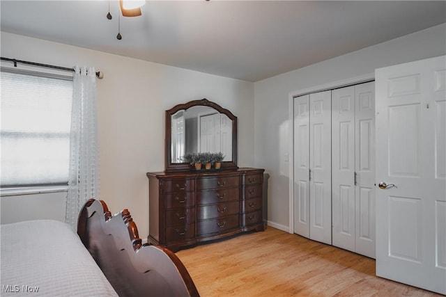 5500 12th Ave, Vienna, WV 26105 - bedroom with light wood-style floors, a closet, and a ceiling fan