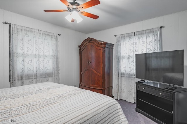 5500 12th Ave, Vienna, WV 26105 - bedroom with dark colored carpet and ceiling fan