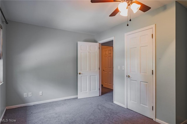 5500 12th Ave, Vienna, WV 26105 - unfurnished bedroom with carpet, baseboards, and ceiling fan