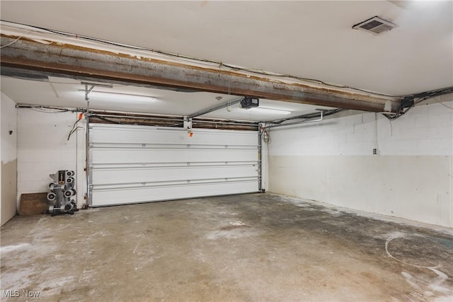 5500 12th Ave, Vienna, WV 26105 - garage featuring a garage door opener