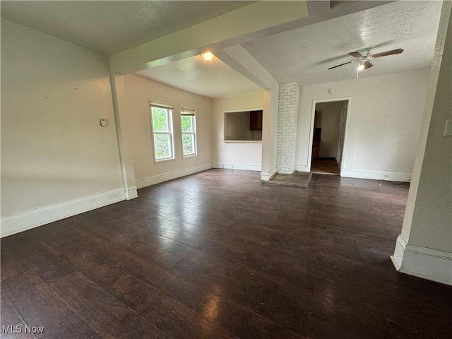 12423 Phillips Ave, Cleveland, OH 44108 - unfurnished living room featuring baseboards, a textured ceiling, hardwood / wood-style flooring, and ceiling fan