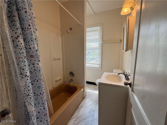 12423 Phillips Ave, Cleveland, OH 44108 - full bathroom with vanity, shower / bath combo with shower curtain, baseboards, and toilet