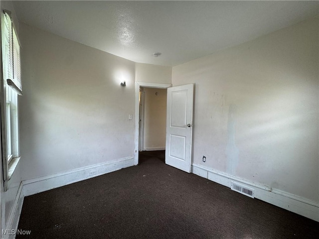 12423 Phillips Ave, Cleveland, OH 44108 - spare room featuring carpet and baseboards