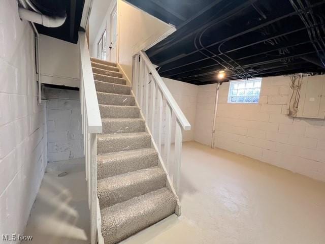 713 N Broadway St, New Philadelphia, OH 44663 - below grade area featuring stairway and electric panel
