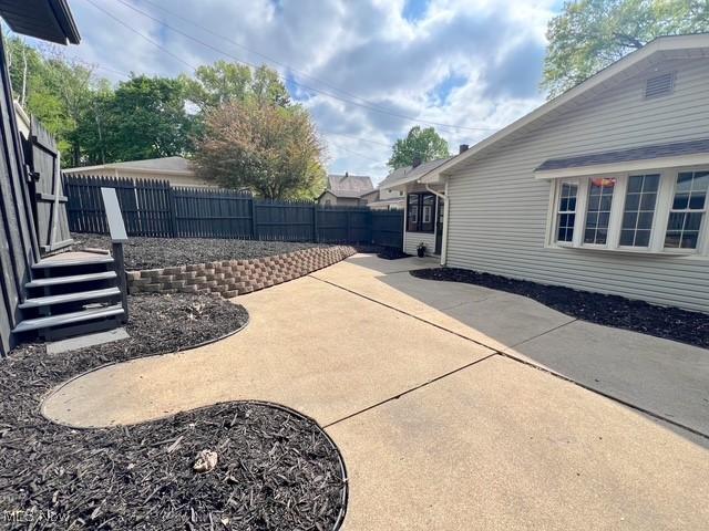 713 N Broadway St, New Philadelphia, OH 44663 - view of patio featuring a fenced backyard