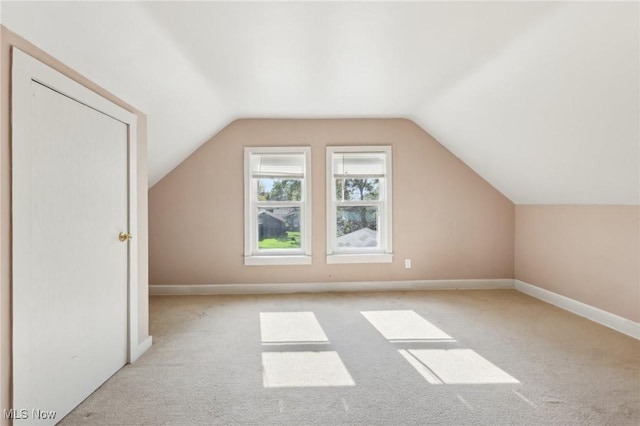 1540 Grand Park Ave, Akron, OH 44310 - additional living space featuring carpet flooring, lofted ceiling, and baseboards