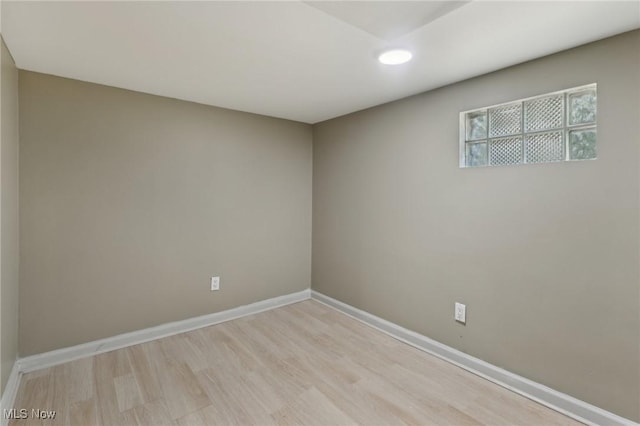 1540 Grand Park Ave, Akron, OH 44310 - spare room featuring recessed lighting, baseboards, and wood finished floors