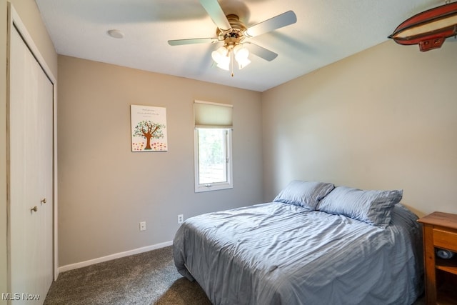 9942 Pebble Beach Cv, Reminderville, OH 44202 - carpeted bedroom with a closet, baseboards, and a ceiling fan