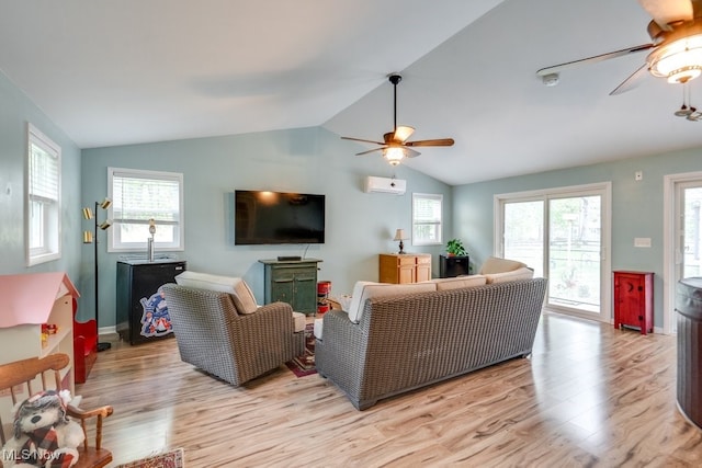 9942 Pebble Beach Cv, Reminderville, OH 44202 - living area featuring ceiling fan, light wood finished floors, vaulted ceiling, and baseboards
