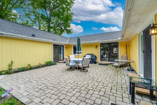 9942 Pebble Beach Cv, Reminderville, OH 44202 - view of patio featuring outdoor dining space