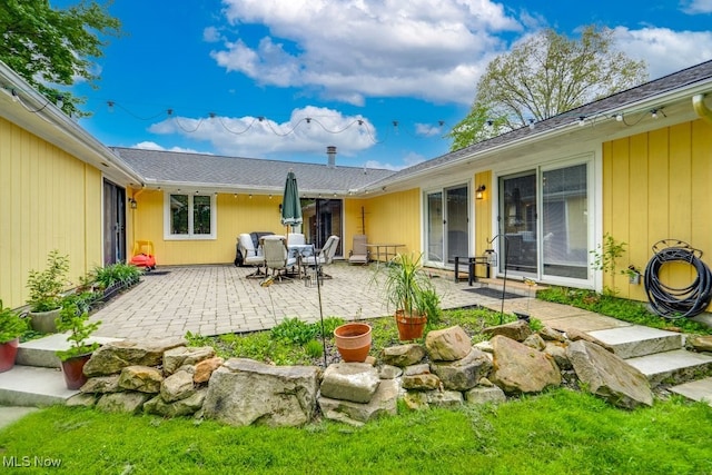 9942 Pebble Beach Cv, Reminderville, OH 44202 - back of house with a patio area