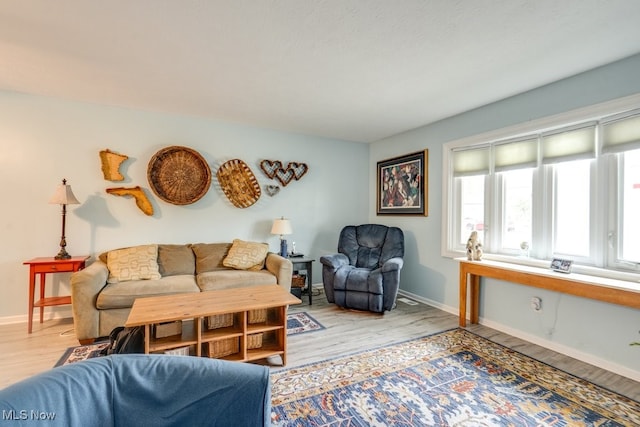 9942 Pebble Beach Cv, Reminderville, OH 44202 - living area featuring wood finished floors and baseboards