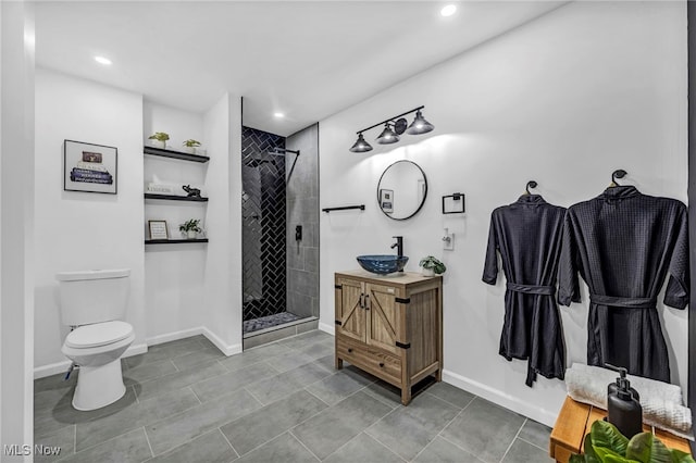2162 Daniels Ave, Akron, OH 44312 - full bathroom featuring tiled shower, recessed lighting, toilet, vanity, and baseboards