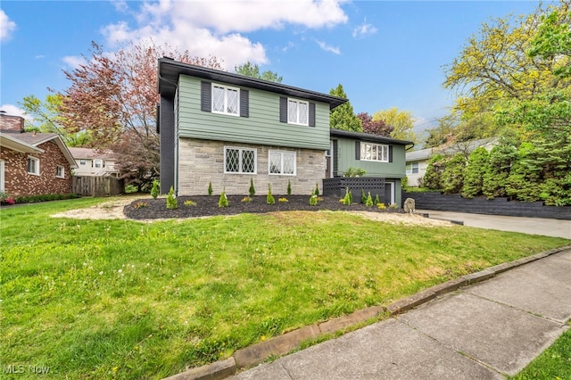 2162 Daniels Ave, Akron, OH 44312 - split level home featuring stone siding