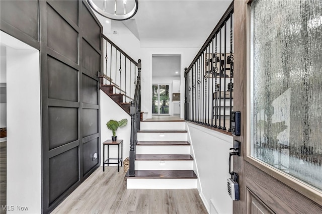 2162 Daniels Ave, Akron, OH 44312 - entrance foyer featuring light wood-style flooring and stairway
