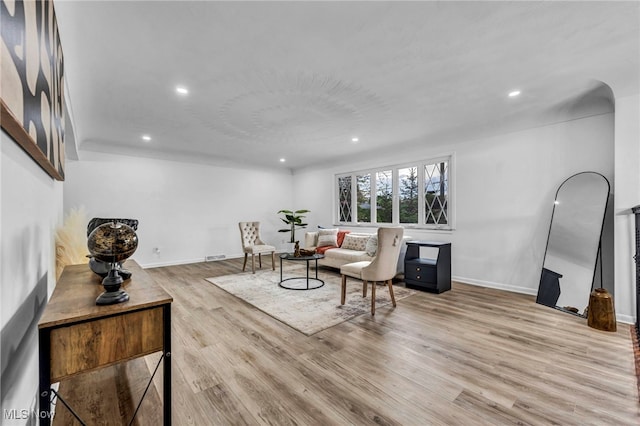 2162 Daniels Ave, Akron, OH 44312 - living room featuring wood finished floors, recessed lighting, and baseboards