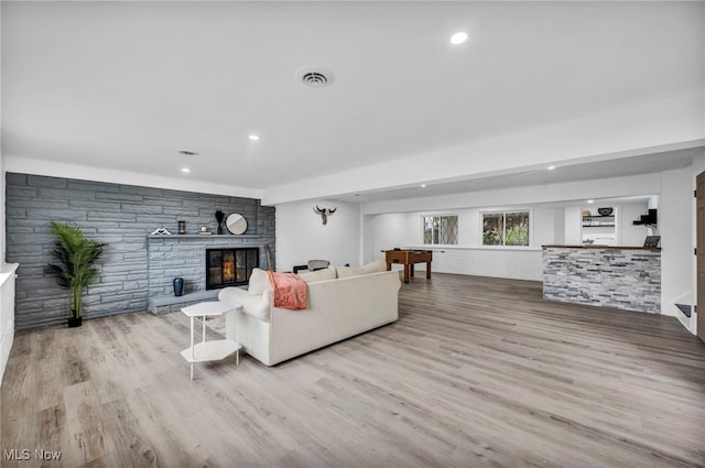 2162 Daniels Ave, Akron, OH 44312 - living area with a fireplace, wood finished floors, and recessed lighting