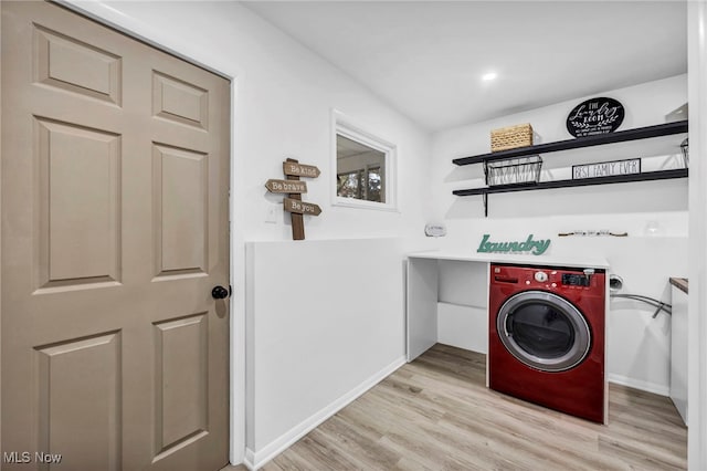 2162 Daniels Ave, Akron, OH 44312 - laundry area with washer / dryer, light wood-type flooring, and baseboards