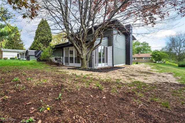 2162 Daniels Ave, Akron, OH 44312 - back of property featuring a sunroom