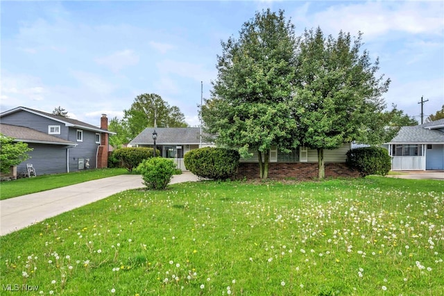view of front of home with a front yard