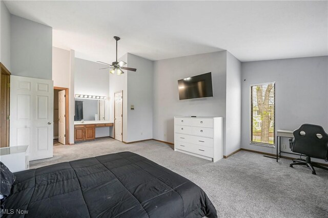 2889 Charing Cross Rd NW, Canton, OH 44708 - bedroom featuring light carpet, baseboards, an office area, and ensuite bathroom