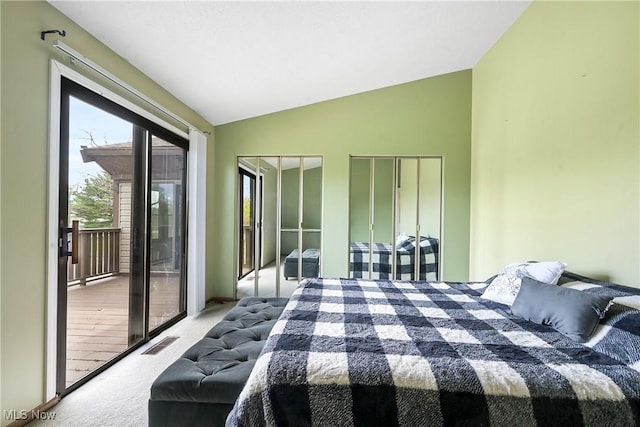 2889 Charing Cross Rd NW, Canton, OH 44708 - bedroom with carpet, access to outside, lofted ceiling, and multiple closets