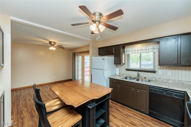 347 Beeler Dr, Berea, OH 44017 - kitchen featuring black dishwasher, a sink, freestanding refrigerator, and ceiling fan