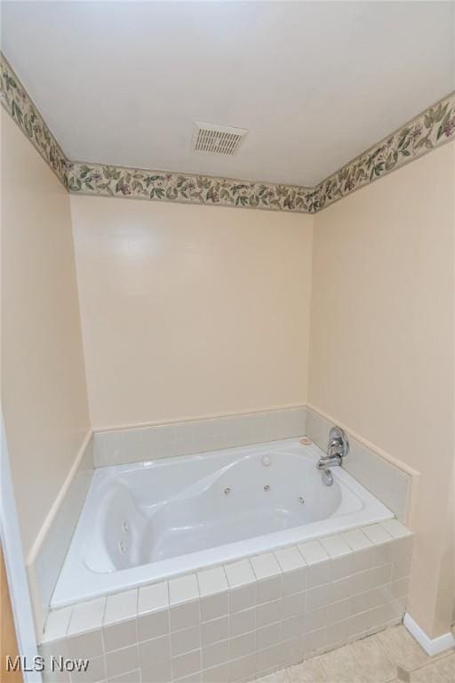 347 Beeler Dr, Berea, OH 44017 - bathroom with a jetted tub and tile patterned floors