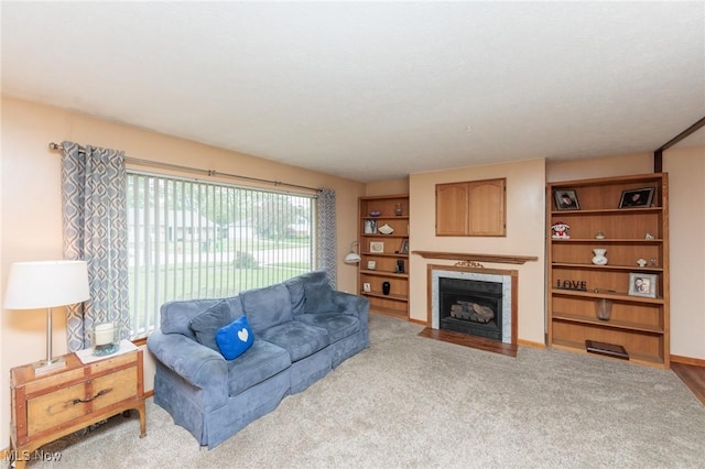347 Beeler Dr, Berea, OH 44017 - living room with a tiled fireplace and carpet floors
