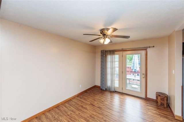 347 Beeler Dr, Berea, OH 44017 - spare room with light wood-style flooring, baseboards, and ceiling fan