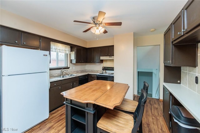 347 Beeler Dr, Berea, OH 44017 - kitchen with black appliances, under cabinet range hood, a sink, dark brown cabinets, and a ceiling fan