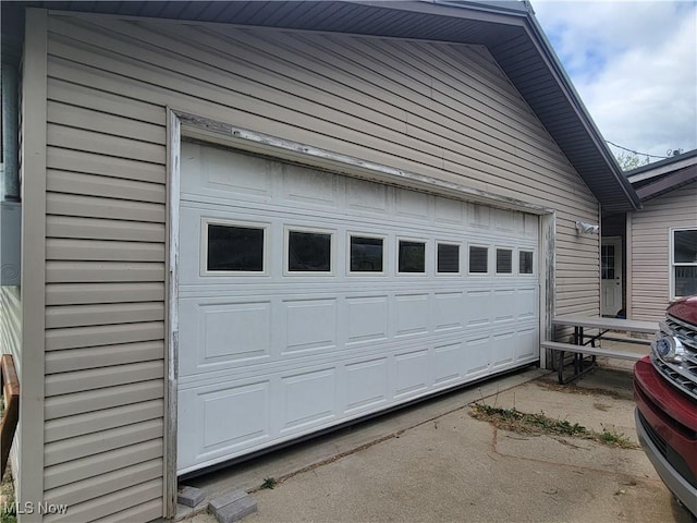 garage featuring driveway