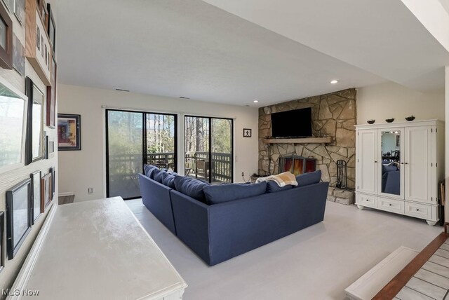 613-3 Fairington Oval, Aurora, OH 44202 - living area featuring a fireplace and recessed lighting